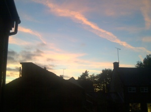 Evening sky over Cropredy roofs.